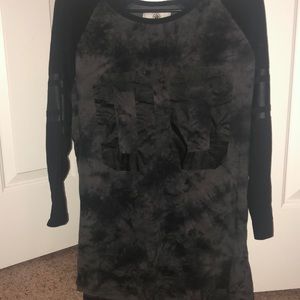 a three-quarter sleeved shirt